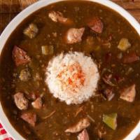 Chicken And Sausage Gumbo · Our spiciest, made with chicken and special Louisiana spicy sausage in a rich dark roux. Thi...