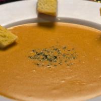 Lobster Bisque · Rich and creamy bisque made with seasoned seafood, spices, and a hint of sherry.
