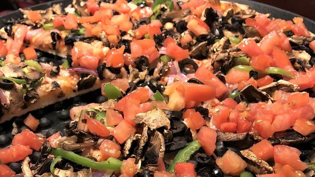 Veg-E-Ta-Bell · Red onions, bell peppers, black olives, fresh mushrooms, fresh tomatoes and topped with pepperoncini peppers.