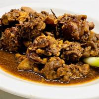 Chicken Adobo · Chicken simmered in soy sauce, vinegar and garlic. A Filipino favorite!
