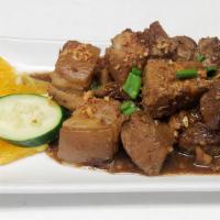 Pork Adobo · Pork simmered in soy sauce, vinegar and garlic. A Filipino favorite!
