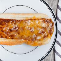 Chili Cheese Dog · Served with ketchup, mustard, relish, and onions.