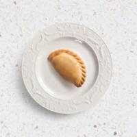 Cheeseburger Empanada · Ground beef cooked in spices with melted cheese.