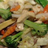 Stir Fried · Combination of mixed vegetables, garlic, carrots, mushrooms, baby corn, cabbage, broccoli, s...