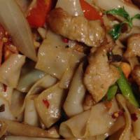 Pad Kee Mao · Flat noodles with bell peppers, basil, tomatoes, onions, fresh garlic, and spicy sauce.