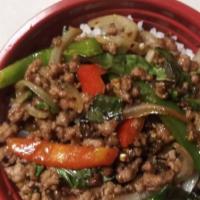 Spicy Meat Bowl  · Stir fried ground meat (chicken, pork, beef) over rice with basil, bell pepper, onion