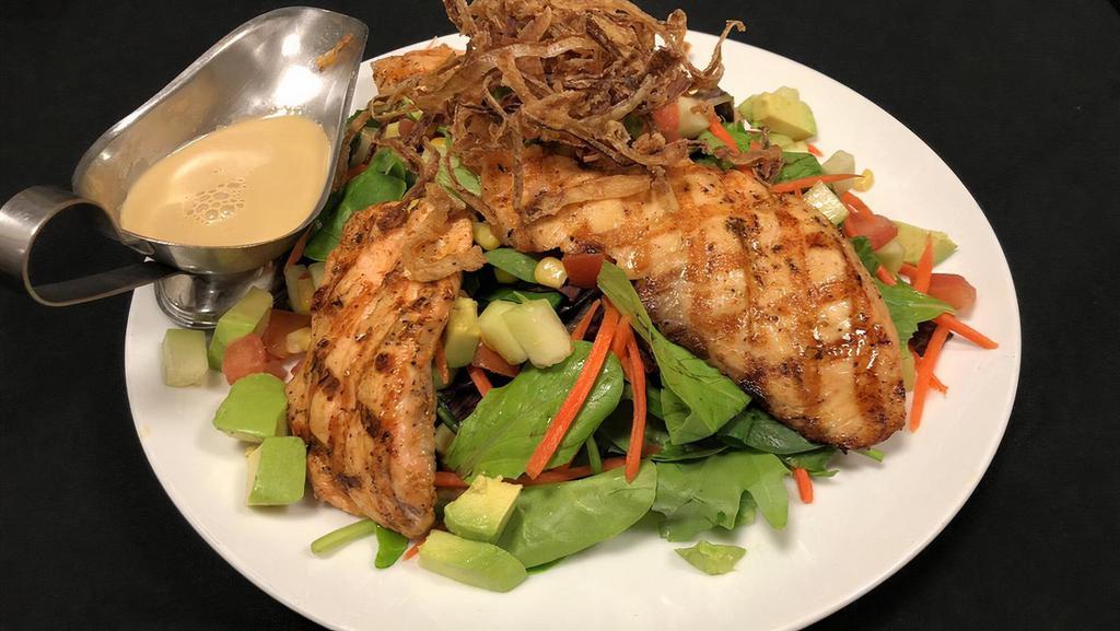 Grill Salmon Salad · Served on her of garden greens, cucumber, tomato, carrot and corn tossed with house dressing