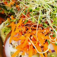 Veg Out! · Bagel topped with avocado, tomato, cucumber, red onion, carrot, sprouts, and toasted everyth...