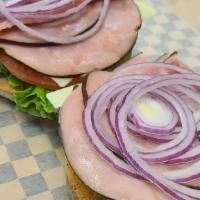 Deli Sandwich · Served open face with lettuce, tomato, red onion, with your choice of meat and cheese