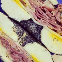 Pastrami Sandwich · New. Bagel filled with Hot Pastrami and Swiss Cheese
