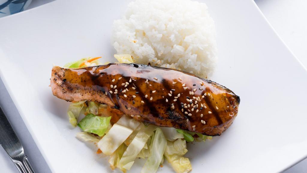 Salmon Teriyaki · grilled skin on salmon served over cabbage with white rice