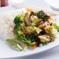 Vegetable Teriyaki · Cabbage, carrot, broccoli, zucchini, bell pepper, sweet potato, and onion.