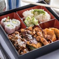 Deluxe Bento · Beef teriyaki, basa katsu, kazoku chicken, gyoza, California roll (3pc.) sunomono & rice.