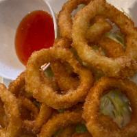 Calamari Rings · Crispy fried pinko calamari rings with spicy sweet dipping sauce