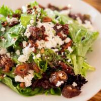 Mixed Greens · Candied pecans, goat cheese, medjool dates, champagne vinaigrette.