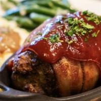 Meatloaf · Wrapped in applewood smoked bacon,
Garlic mashed potatoes, green beans, gravy.