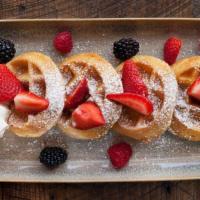 Belgian Waffle · fresh berries, maple-butter syrup, pecan butter