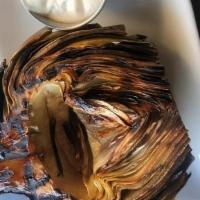 Grilled Artichoke · Grilled to order, garlic aioli dipping sauce