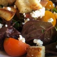 House · mixed greens, roasted corn, farmer's market tomatoes, goat cheese, croutons, champagne vinai...