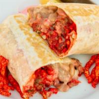 Xxtra Flamin' Hot Burrito  🌯  · Flour Tortilla, Carne Asada, Cilantro, Onion,  Pinto Beans, Rice, Salsa, Cheese, Secret Sauc...