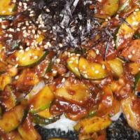 오징어 돌판/ Ojingeo Dol Pan · Hot stone pot served with chopped squid, vegetable, mixed rice, red chili paste