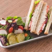 Tuna Sandwich · Choice of bread, topped with lettuce, tomato, onion, with side salad & pickles. Make it a me...