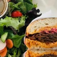 Bbq Brisket Panini · 14 Hour Smoked BBQ Brisket, melted cheddar, pickled onions, chipotle mayo, served with side ...