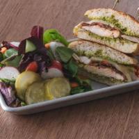 Chicken Pesto Panini · Grilled chicken, roasted garlic tomatoes, balsamic caramelized onions, melted Swiss cheese, ...