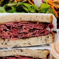 Hot Pastrami Sandwich Combo · Smoked pastrami piled on fresh Rye bread.  Choice of chips and a drink