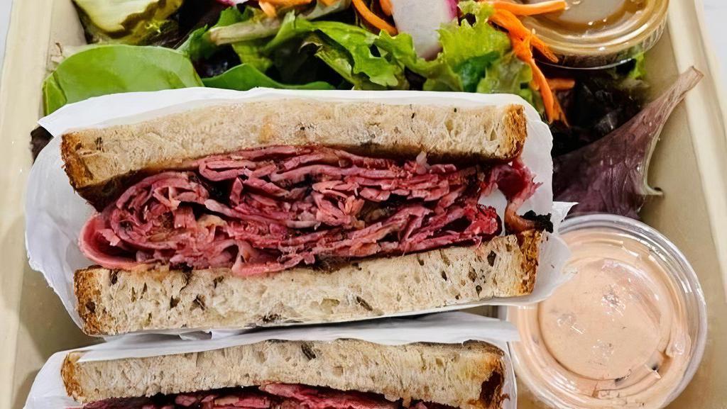 Hot Pastrami Sandwich Combo · Smoked pastrami piled on fresh Rye bread.  Choice of chips and a drink