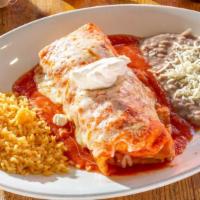 Burrito Ranchero · Charbroiled choice of meat with delicious salsa, melted Monterey jack cheese, and sour cream.