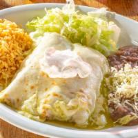 Enchiladas Suizas With Meat · Two corn filled tortillas filled with melted Monterey jack cheese, smothered in special mild...
