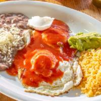Huevos Rancheros · Fried eggs served any style with corn tortillas, charbroiled choice of meat, and authentic r...