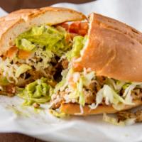 Tortas (Mexican Sandwich) · Served with choice of meat on a grilled Mexican bun, with beans, cheese, sour cream, fresh l...