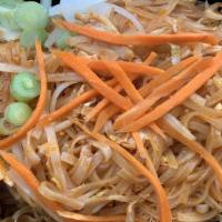 Pad Thai · Thai rice noodles with egg, green onion, and bean sprouts served with crushed peanuts.