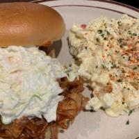 Pulled Pork · Pulled Pork on brioche  bun with jack cheese topped with coleslaw