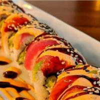 Rainbow Roll · Inside; crab, cucumber. Outside; salmon, avocado, tuna, and albacore.