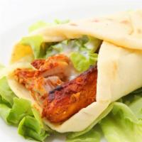Chicken Kabob Wrap · Hearty chicken kabobs, locally grown lettuce, and creamy tzatziki wrapped in a warm pita