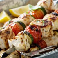 Chicken Kebab Skewer Plate · Boneless and skinless premium chicken threaded on two skewers and grilled over charcoal fire...
