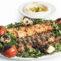 Kafta Kabab Plate · Two skewers of premium ground beef and lamb, marinated with onions, parsley and spices. Serv...