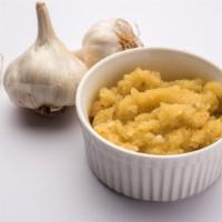 Garlic Paste · Locally grown garlic made into a creamy paste sauce.