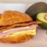 Ham, Cheese,  Egg, & Bacon Breakfast Sandwich · Hot Breakfast made to order. A. Bread (Croissant , Bagel or Toast), 2 Eggs, Bacon, Ham or Tu...