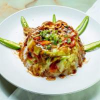 Teriyaki Bowl · Steamed rice, cabbage, carrots, broccoli, teriyaki sauce, and your choice of meat.