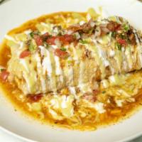 Wet Burrito · Chile Verde, rice, beans, sour cream, guacamole sauce, salsa, pico de gallo, and cheese.