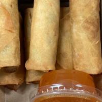 Fried Veggie Rolls (No Meat) · 6 pcs fried veggie rolls  served with sweet chili sauce.