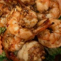 Garlic & Pepper · Stir fried garlic and black pepper in our house soy sauce served with steam broccoli and car...