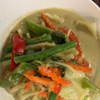 Green Curry 22Oz · Coconut milk, bamboo shoot,  bell pepper, and basil