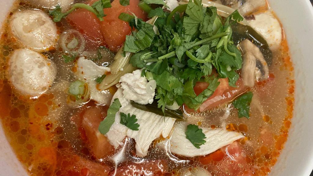 Tom Yum Soup 30Oz · can be, hot/sour chicken broth soup with Thai herbs, lemongrass, lime leaves, lime juice, tomato, white mushroom, onion, and cilantro.