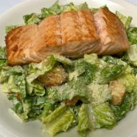 Salmon Caesar Salad  · Grilled Salmon, romaine, house-made croutons, parmesan cheese.