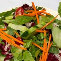 House Salad · Mixed greens, cucumbers, carrots, tomatoes, choice of dressing